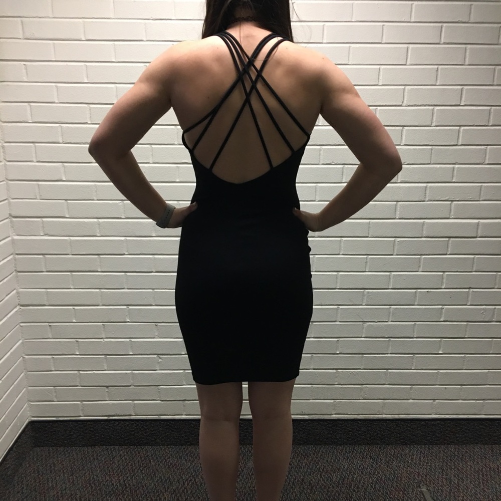 Black deep plunge strappy back cocktail dress
