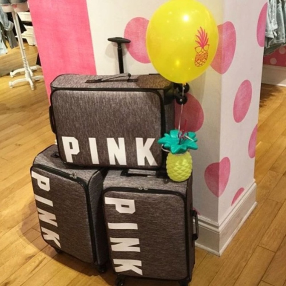 Pink Wheelie Luggage.
