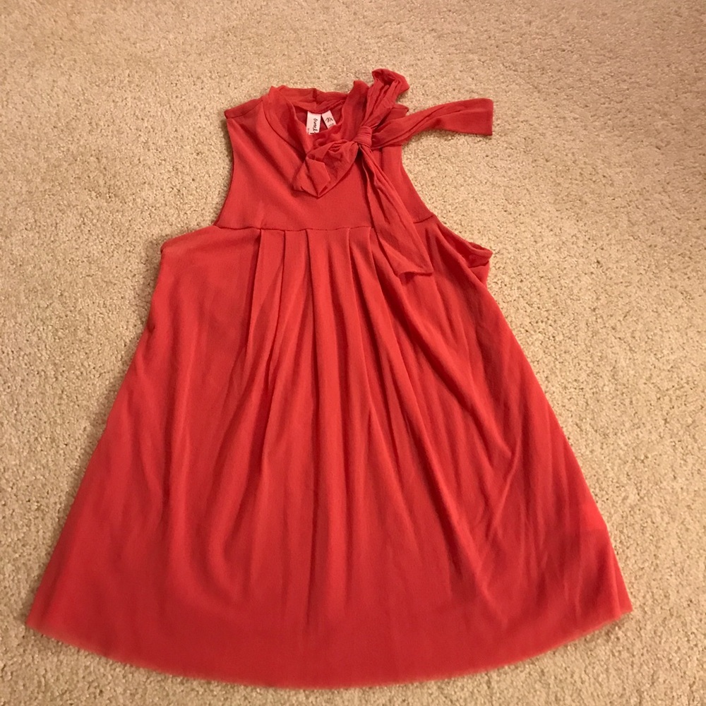 Sweet Pea sleeveless blouse.