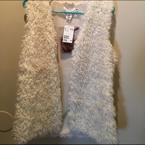 White faux fur vest!