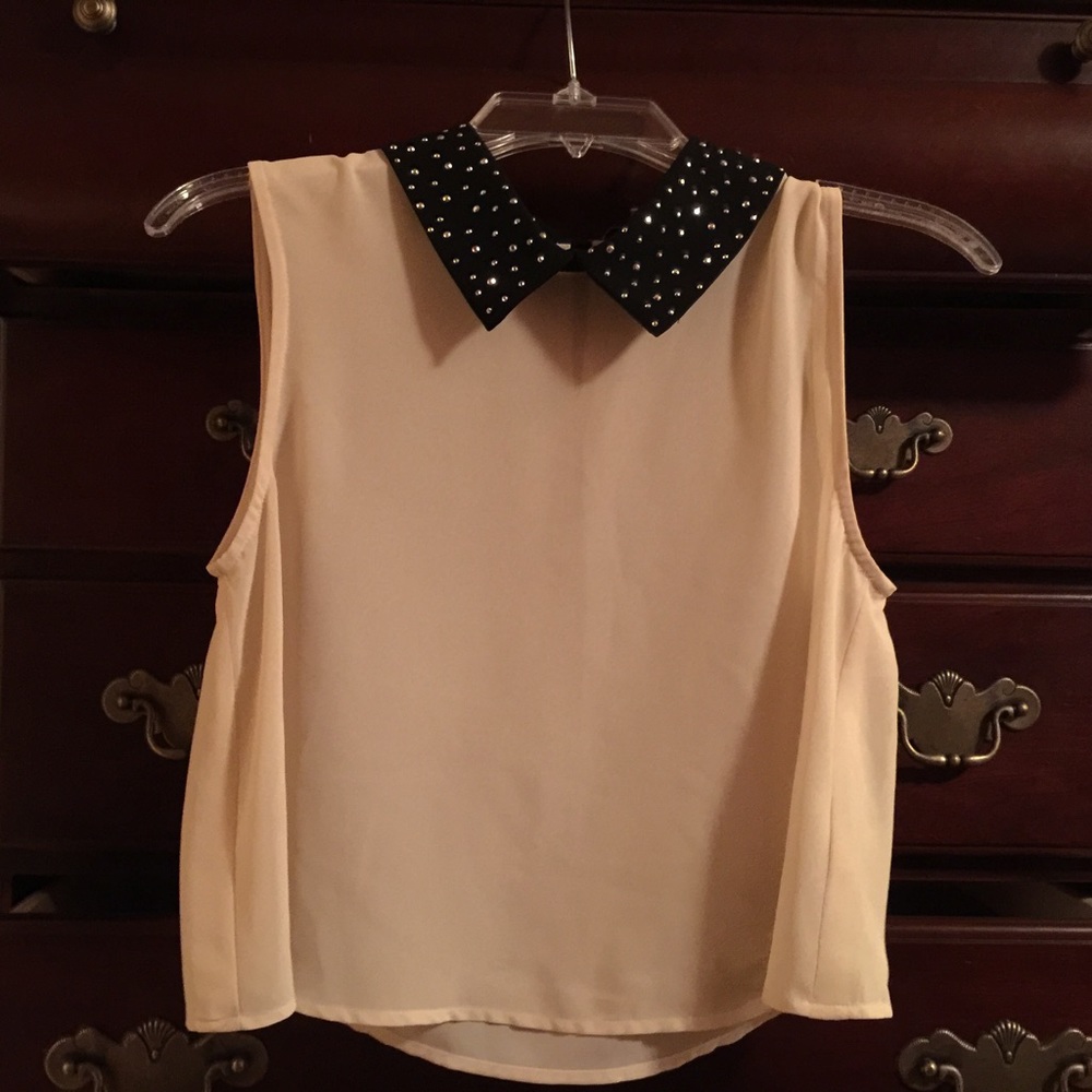 Sleeveless dressy top.