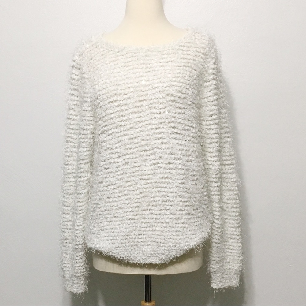Jennifer Lopez white fuzzy sweater with bow