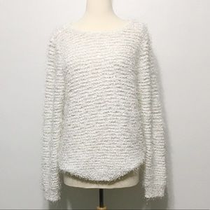 Jennifer Lopez white fuzzy sweater with bow