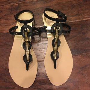 Dolce Vita Black and Gold Flat Thong Sandals