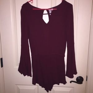 Maroon romper with open back and fun sleeves