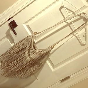 Fringe H&M cream purse.