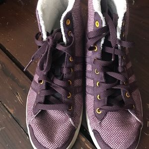 Purple adidas high tops