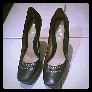 Black gold studded L.A.M.B stilettos