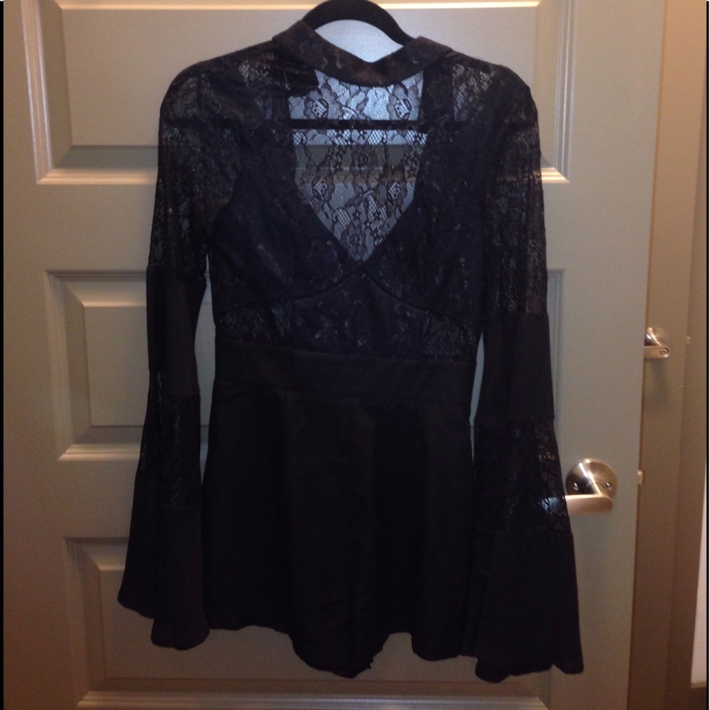 Super cute black Lacey romper size S