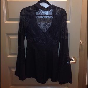 Super cute black Lacey romper size S