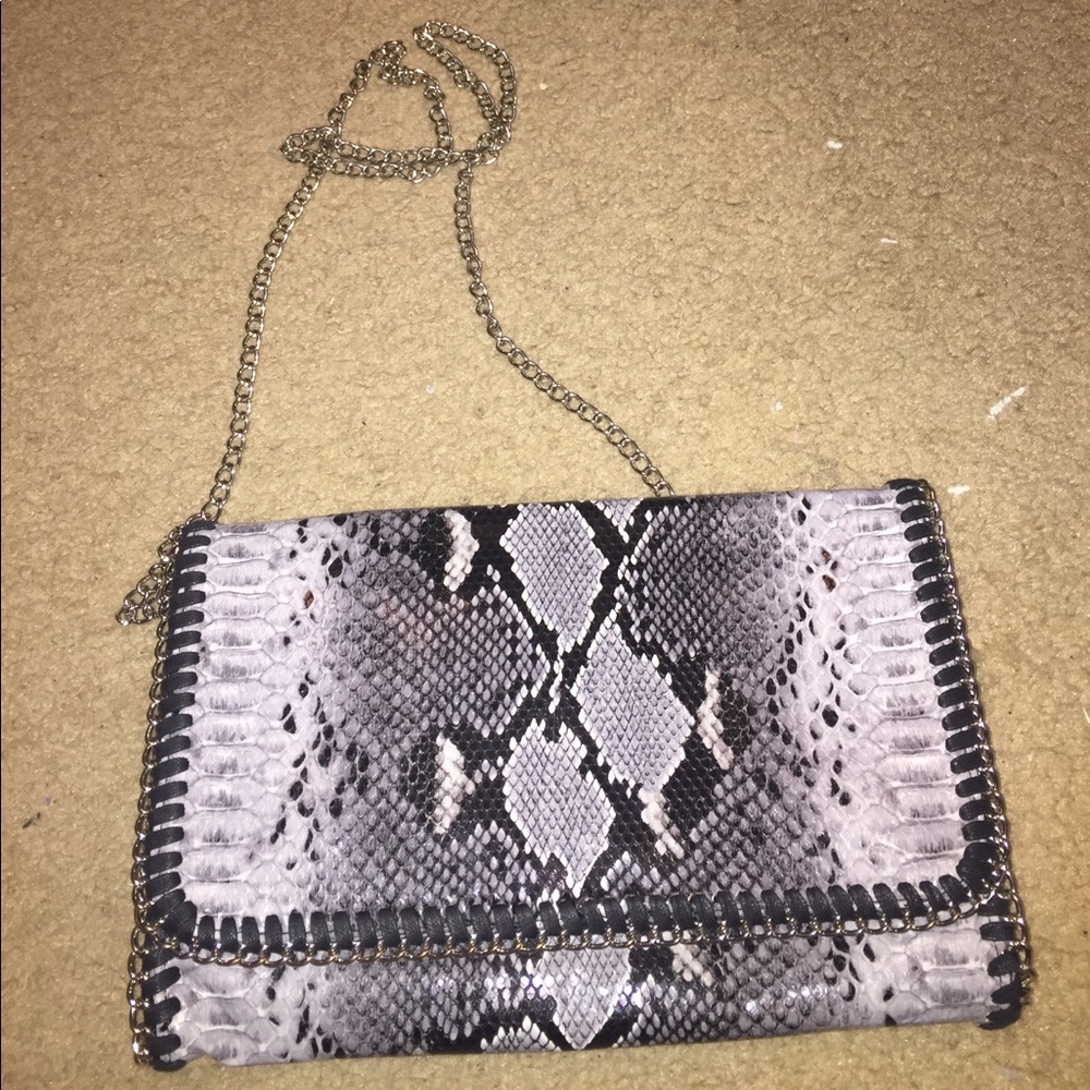 Leopard print Phases cross body purse.