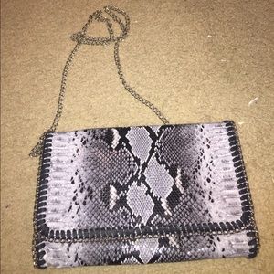 Leopard print Phases cross body purse.