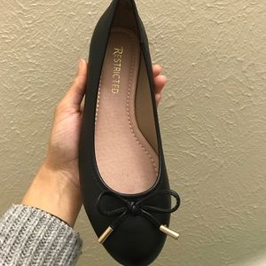 black ballet flats
