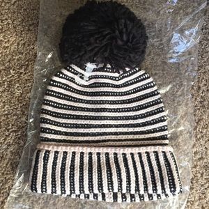 Hat with pom