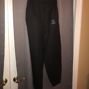 Large black sweatpants with rhinestone pocket