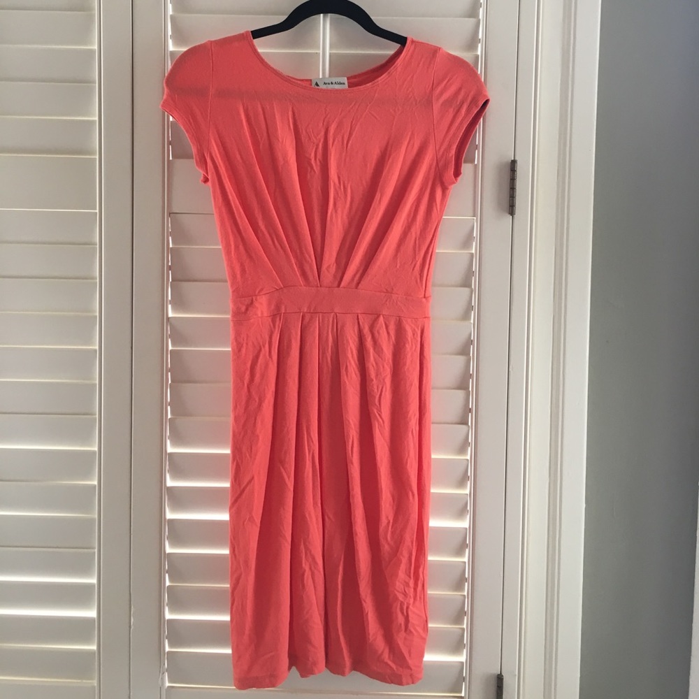 Orange pleated dress
