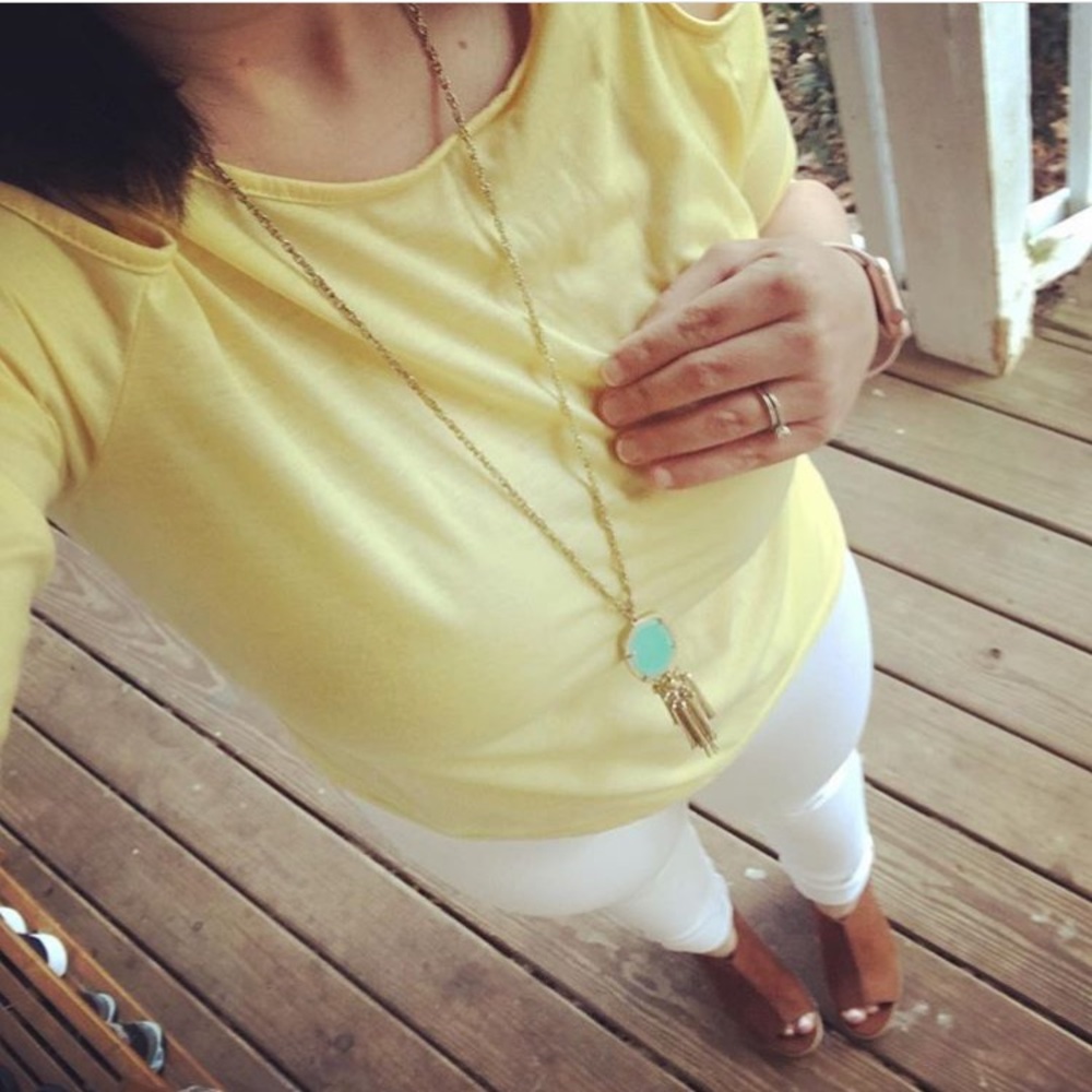 Pale yellow cold shoulder top