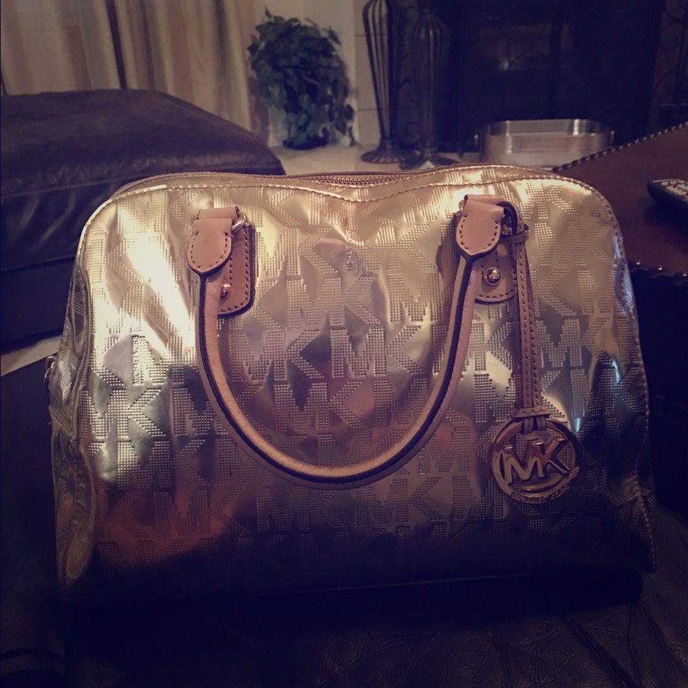Michael Kors gold purse. Large