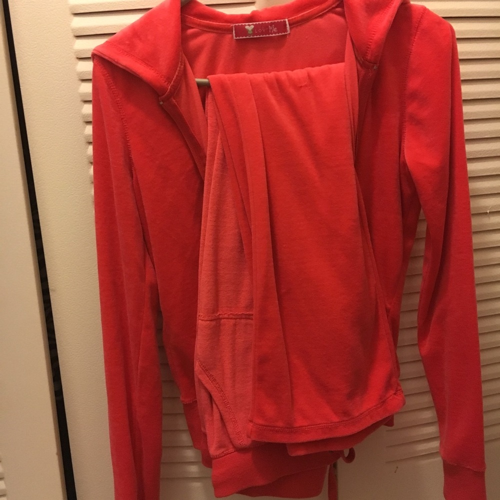 Orange velour track suit
