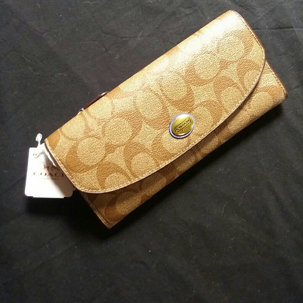 Authentic Coach wallet New with tags Purple Lining Msrp $238