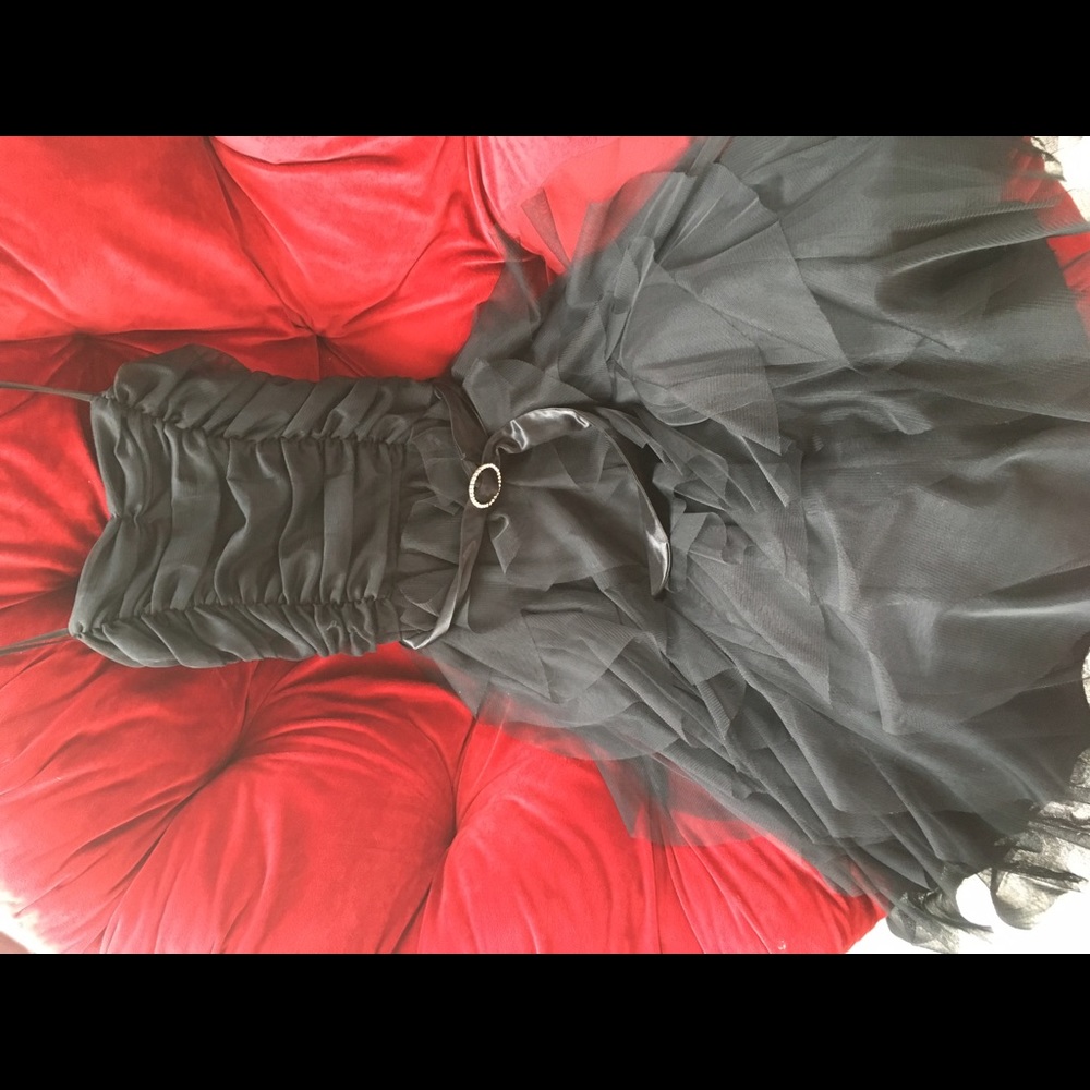 Strapless black formal dress.