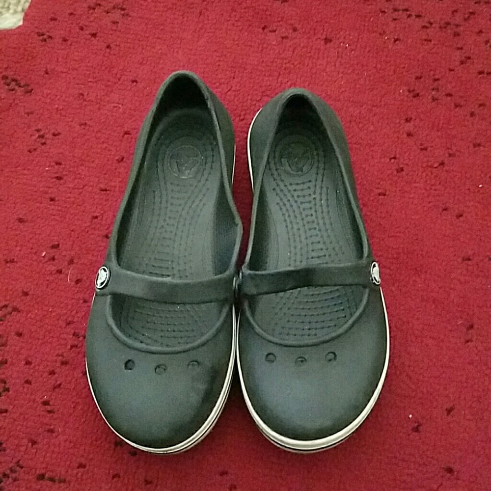 Kids Crocs black with white trim size 12.
