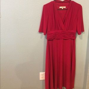 Flattering wine colored dress.