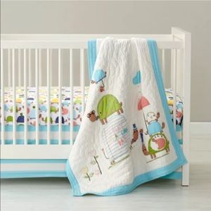 Land of Nod Blue and white stripe crib skirt