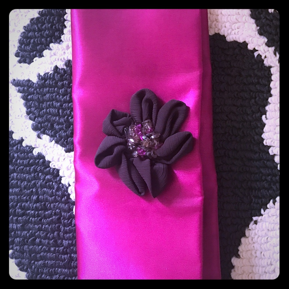 Avon fuchsia embellished clutch