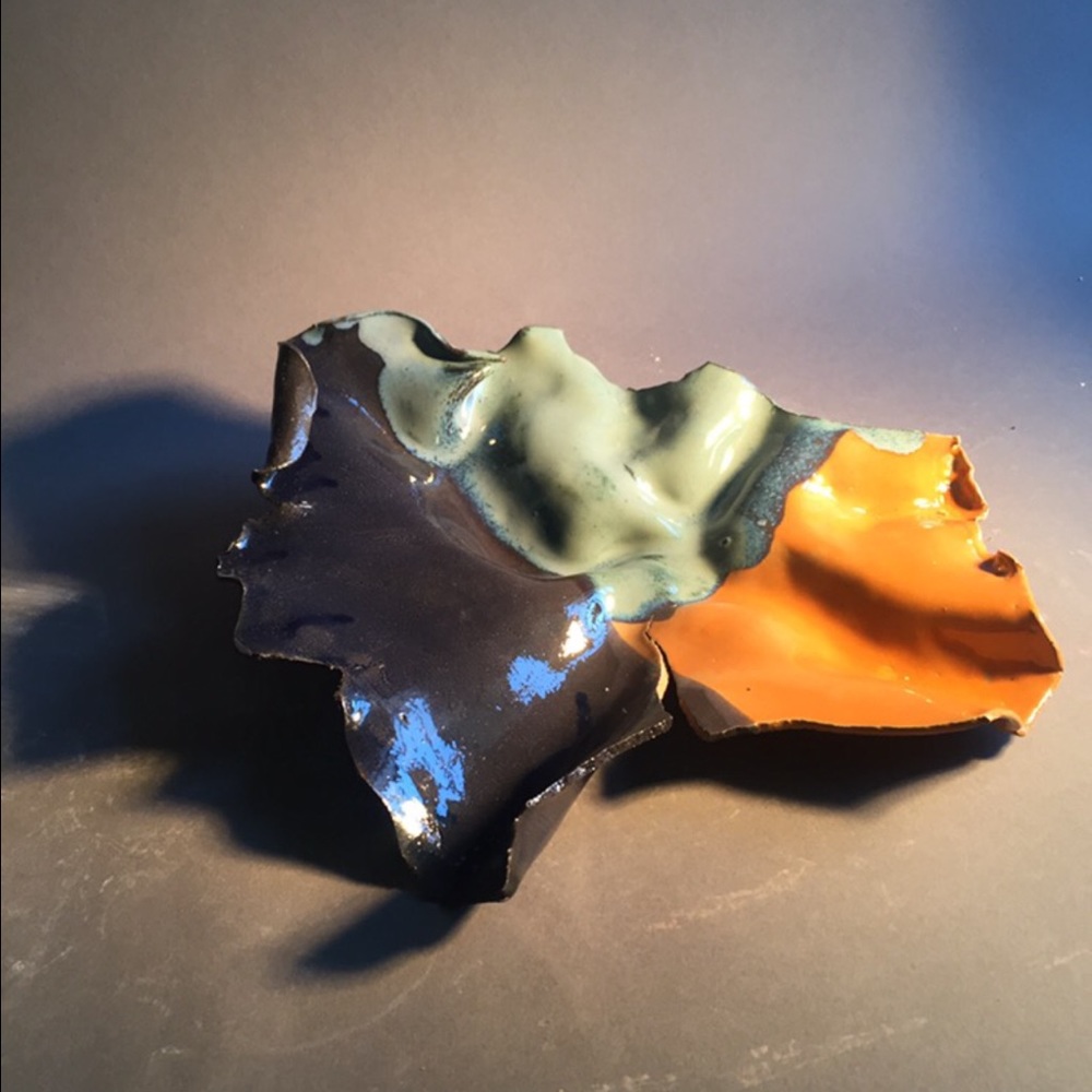 Center piece. Ceramics art. Blues and orange