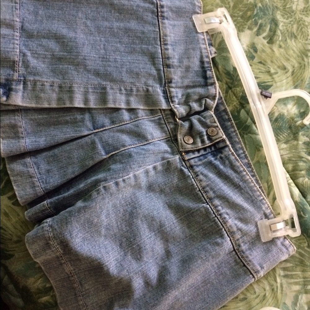 Wrap around pleated denim skirt.