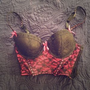 Lacy pink and black bra