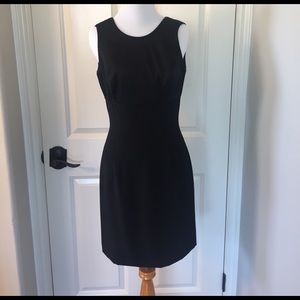 Black cocktail dress with dramatic v in back