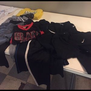 7 sweat pants 1 sweatshirt and 1 tank top