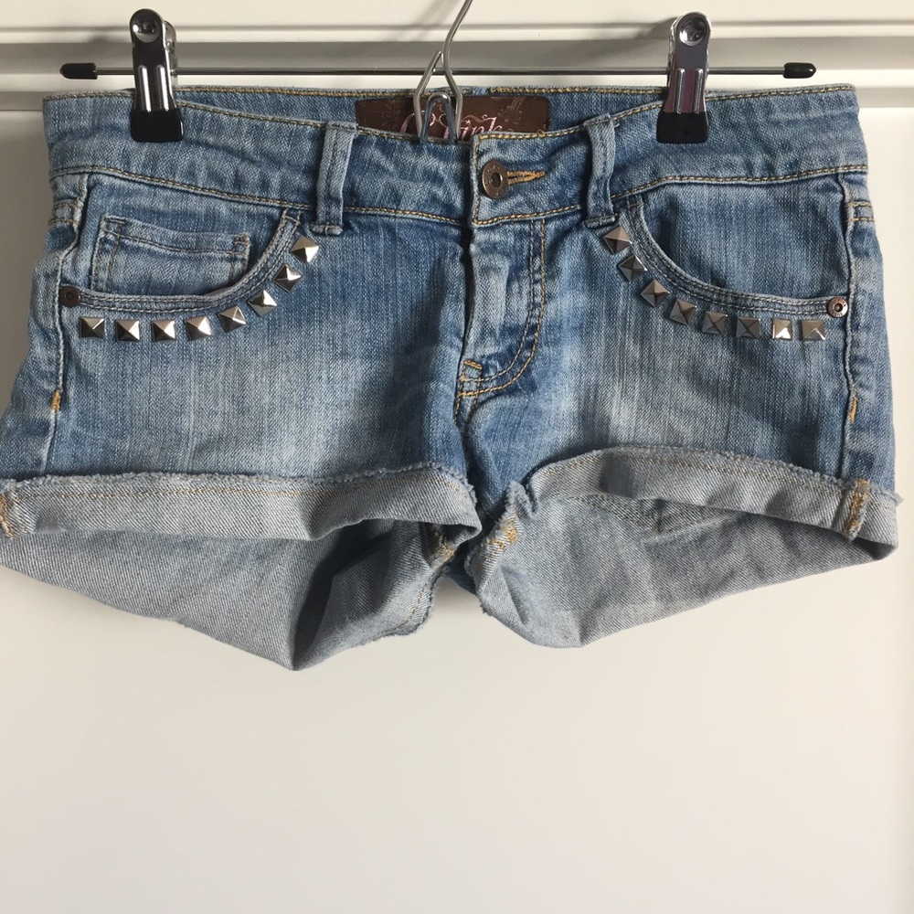 Custom studded, light wash jean shorts