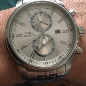 Invicta watch with spare links.