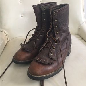 Vintage brown combat boots with fringe detail
