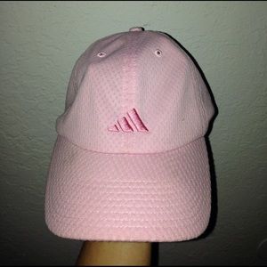 Adidas pink hat.