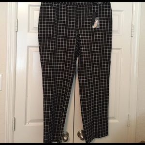 Black and white slacks.