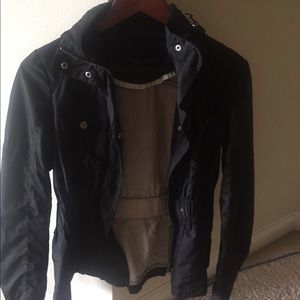 black Zara raincoat cinched waist