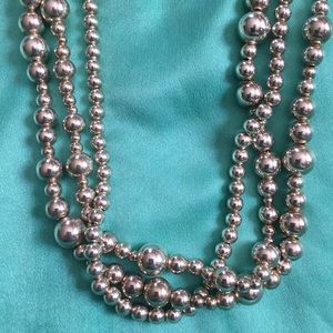 Silver beaded necklace and bracelet