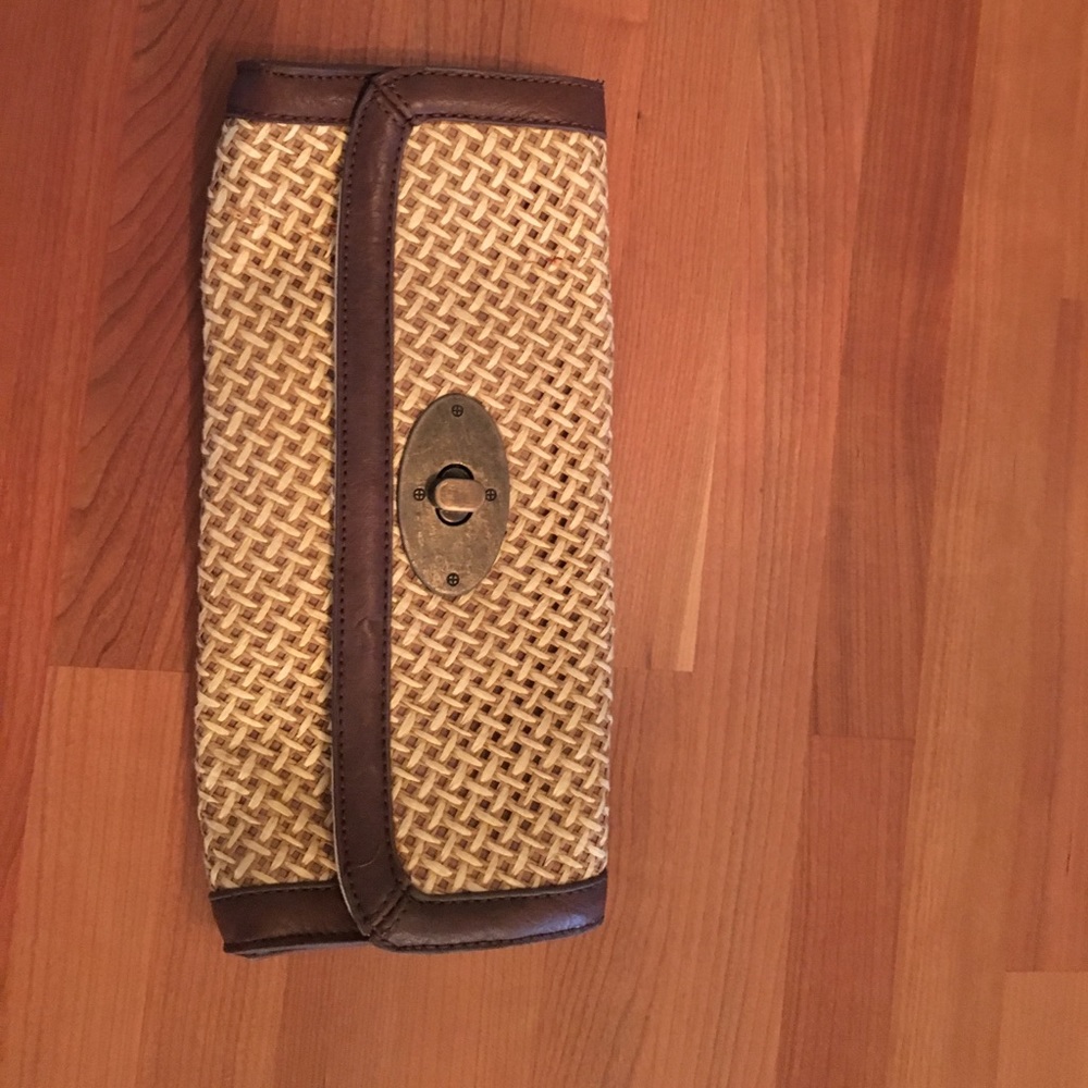 Straw and leather clutch