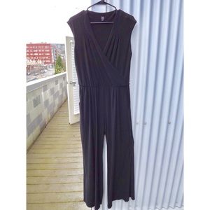 Black stretchy jumpsuit with plunging neckline