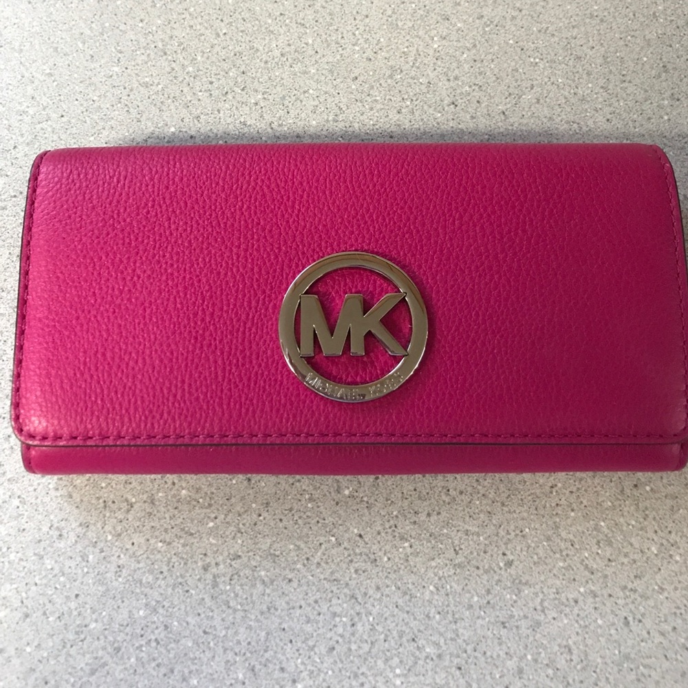 Michael Kors wallet.                   Sold