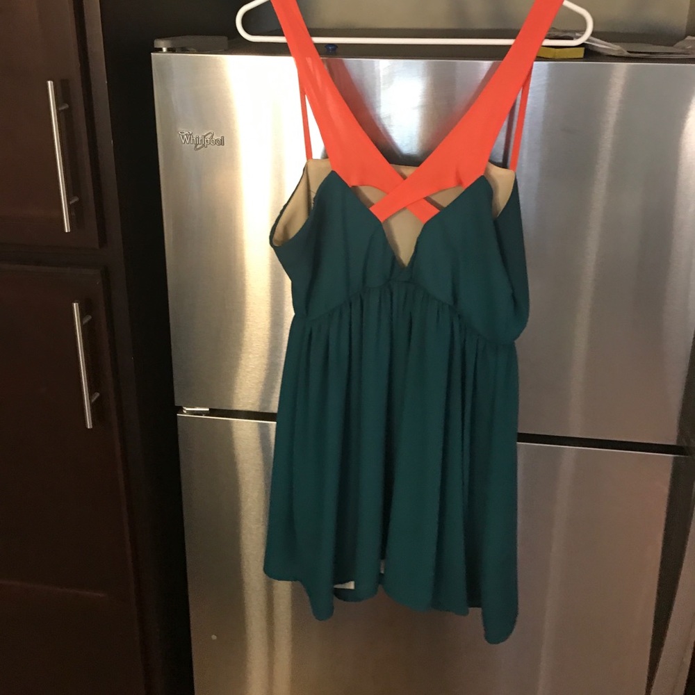 Teal and coral boutique dress, hits at knee
