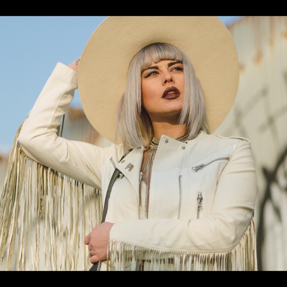 Off white faux leather extreme fringe moto jacket