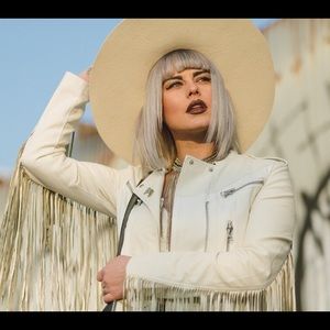 Off white faux leather extreme fringe moto jacket