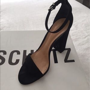 Schutz black chunky heels straps sandal.