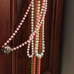 Multiple vintage multicolored beaded necklaces
