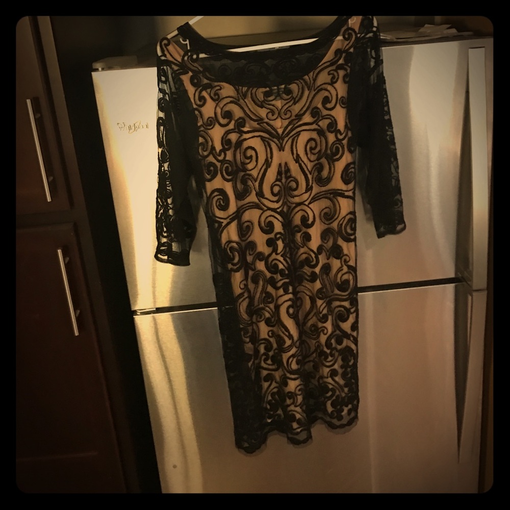 Gorgeous black lace over tan designer dress.